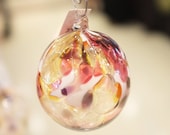 Handblown ruby, purple and gold glass ornament