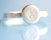 a SMATTERING of STONES ring, stacking ring with a cluster of clear CZ, eco-friendly silver. Handcrafted by Chocolate and Steel