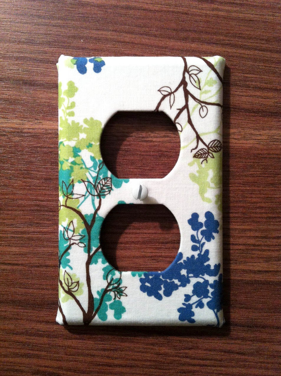 Outlet Cover, wall decor - white with blue, green, teal, and brown foliage twigs - Erin Ries Branches in White