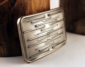 horizontal brads in white buckle