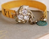 Relic.rhinestone charm measuring tape bracelet. tiedupmemories