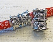 One pewter tube bead, finely detailed, 15 x 10mm, hole 4mm