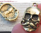 CHARM SALE Pewter skull with mustache charm, antique gold finish, 22 x 13 x 3mm