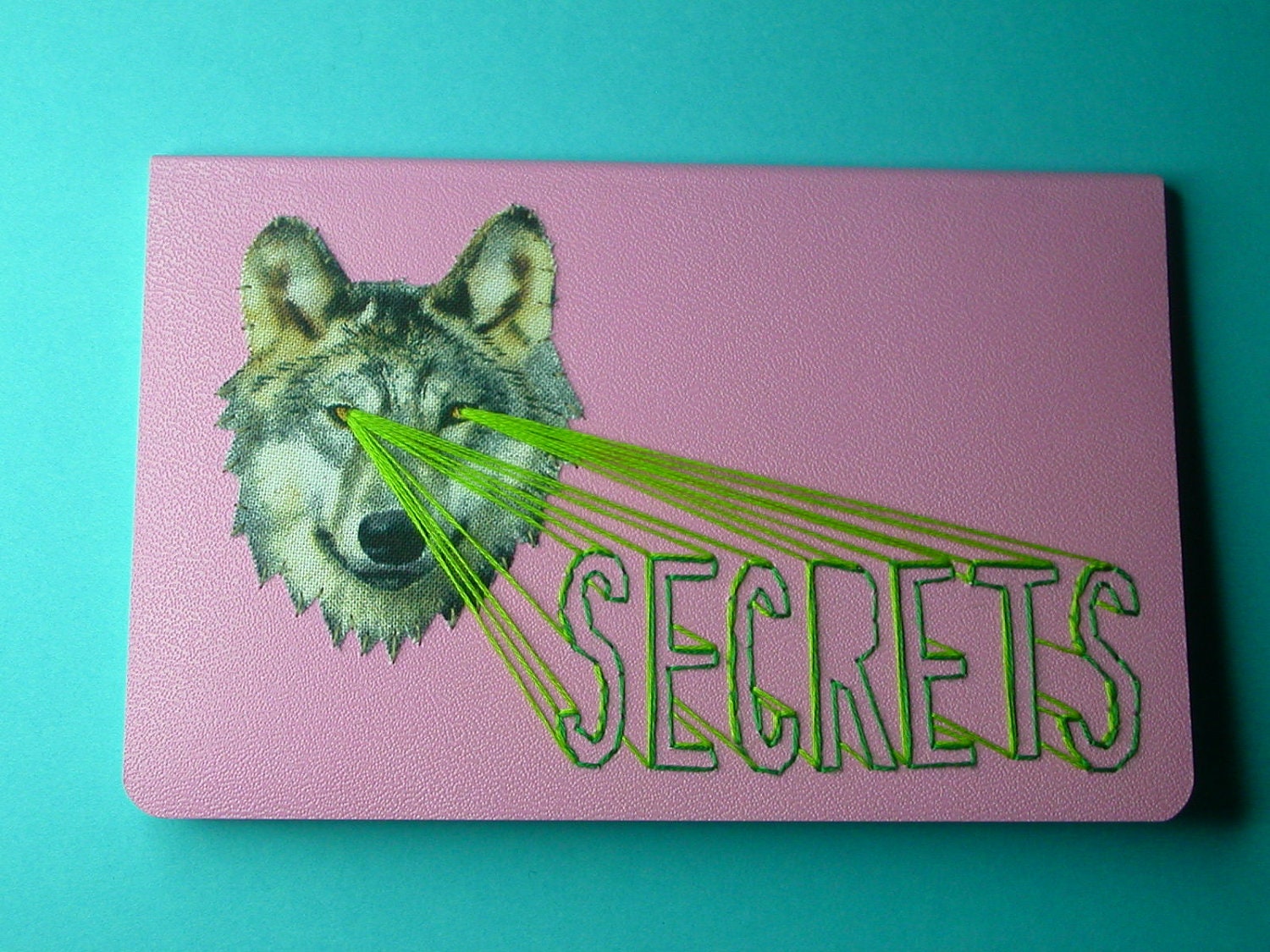 SECRETS laser-eye wolf pocket notebook