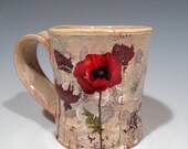 Mug with vintage flowers and subtle yellow glaze
