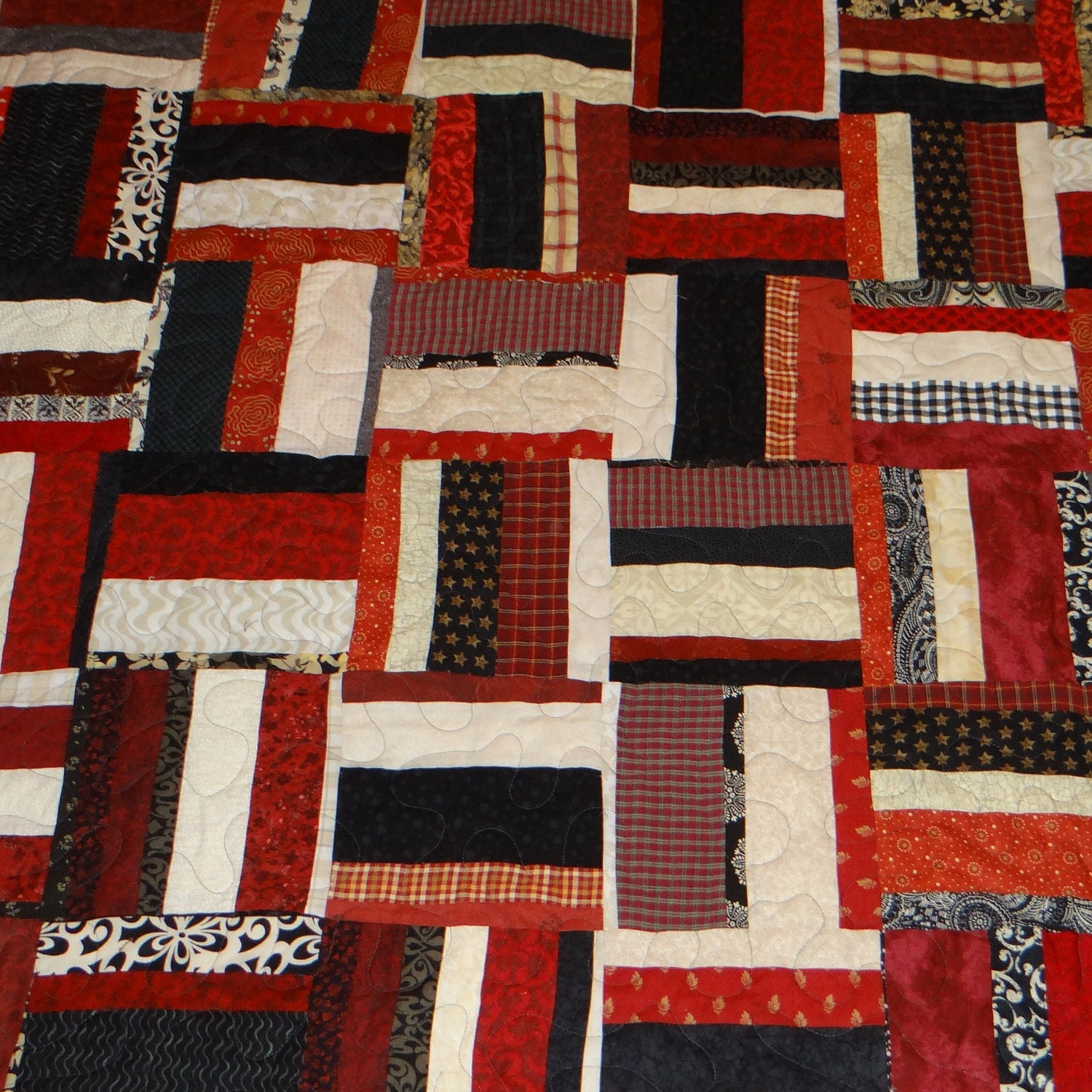 Quilt shop closing Red, black, grey and tan queen size quilt