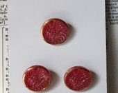 Vintage glass buttons Burgundy dark red and gold round qty 3 Schwanda NOS