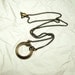 Brass Eternity Circle 'Love' Necklace