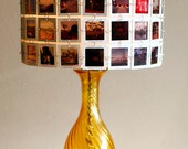 Lampshade made from vintage slides with amber glass base.