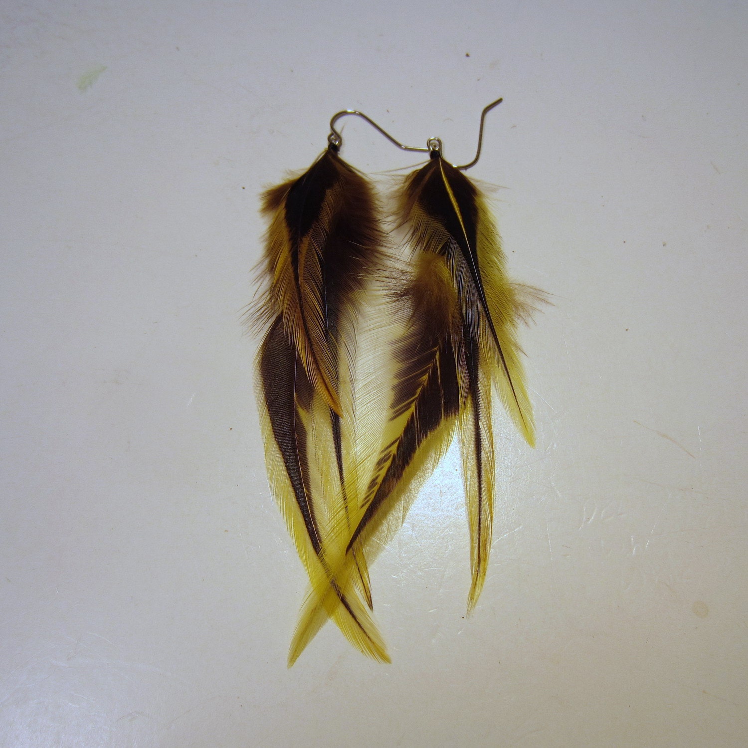 feather earrings Yellow Badger