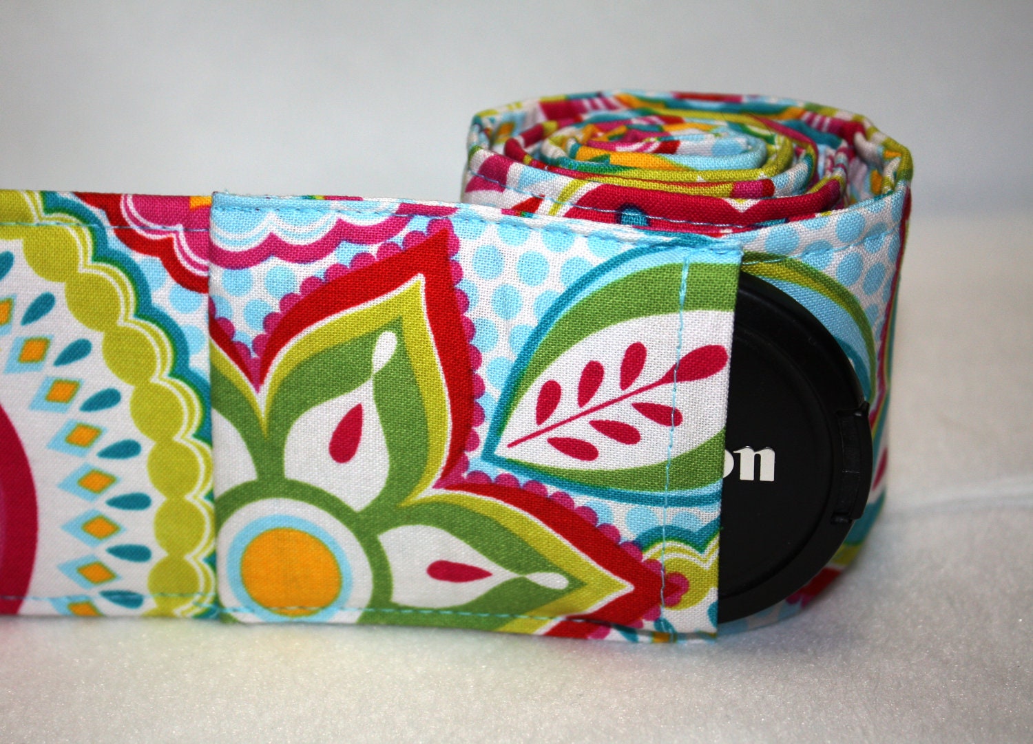 Camera Strap WITH LENS CAP pocket, Rio