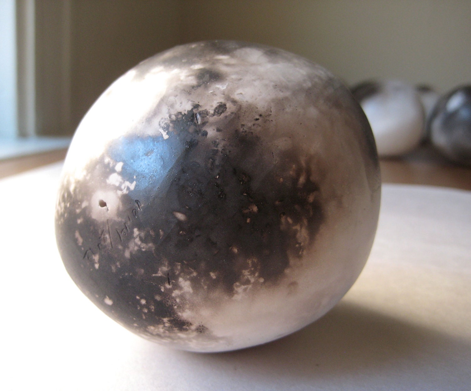 Pit-fired Porcelain Rattle filled with Columbia River Pebbles: 10.14