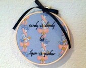 Candy is dandy but liquor is quicker - hand-stitched wall hanging