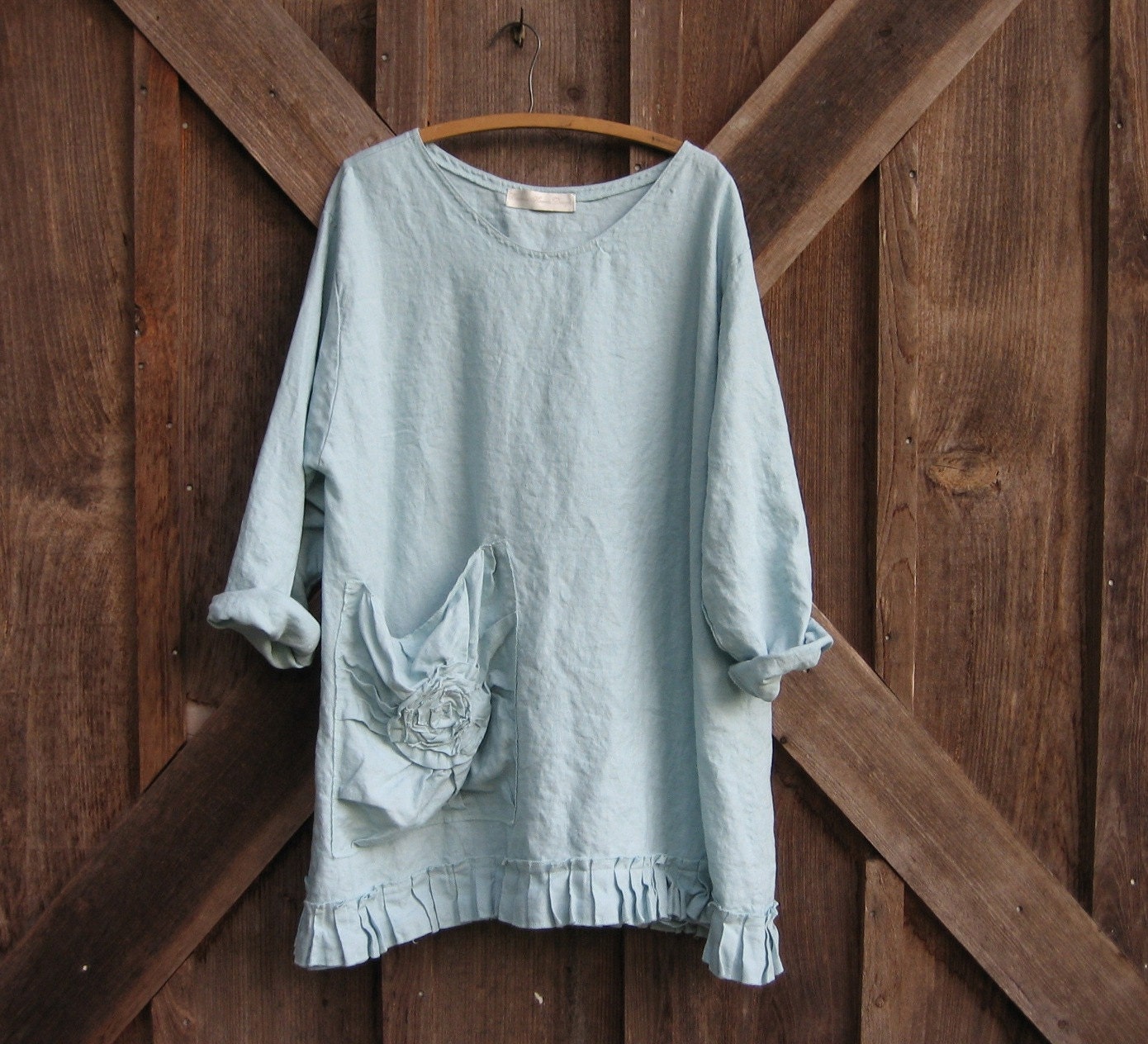 linen top  with rose pouf pocket in light blue