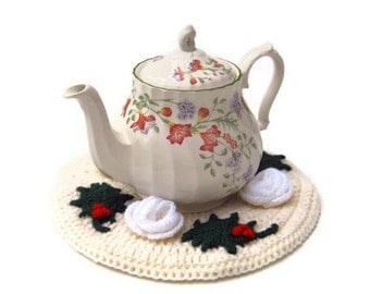 Christmas teapot coaster hot pad table decoration crochet mat with holly berries and sparly Christmas roses