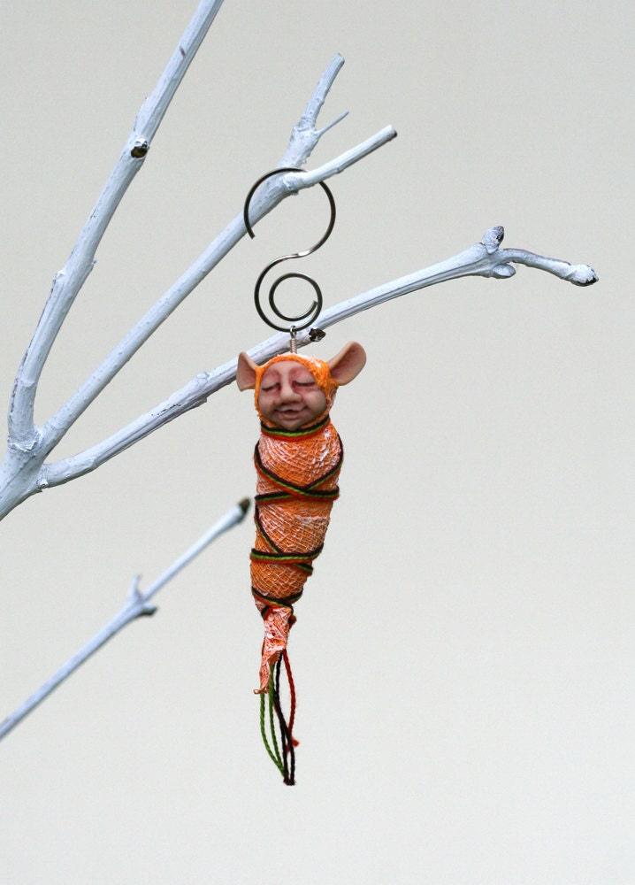 Sleeping baby elf. Polymer clay miniature by Madre Olius
