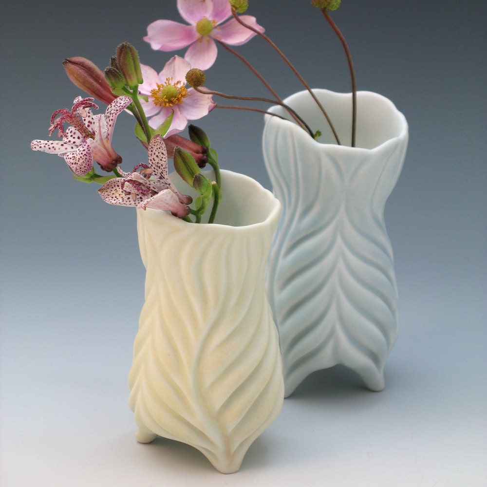 Hand carved pale yellow porcelain curvy vase