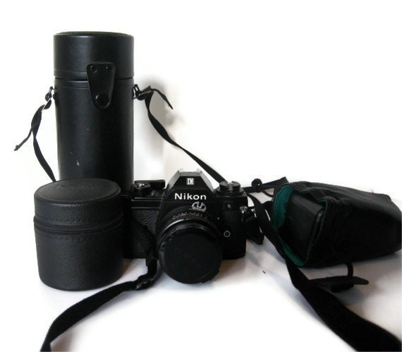 Full Nikon EM Camera Set With Flash and Two Telephoto Zoom Lenses