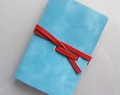 Leather Notebook / journal / travel booklet / sketch book pocket size in blue turquoise leather and a red leather strap