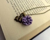 SALE.  Read. Brass Book and Purple Ruffle Flower Necklace.