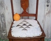 Upcycled wooden old farmhouse chair repurposed with shabby chic antique quilt