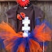 Football baby onesie and tutu With matching hair bow in sizes: newborn, 0-3mo, 3-6mo, 6-12mo, 12-18mo(t-shirt),or 18-24mo