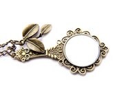 Vintage Style Hand Mirror and Leaf Necklace
