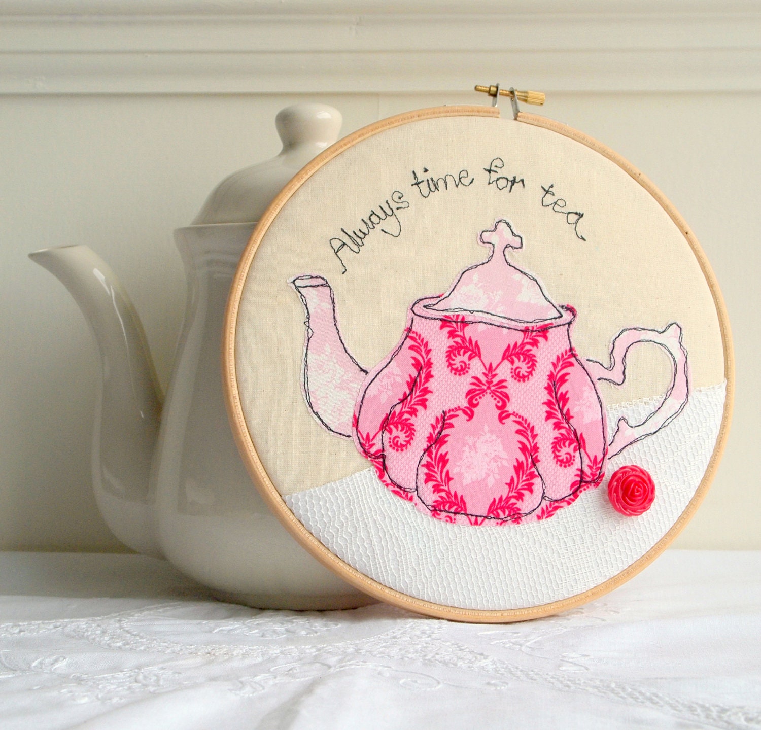 Teapot in pink embroidery hoop art applique machine embroidery