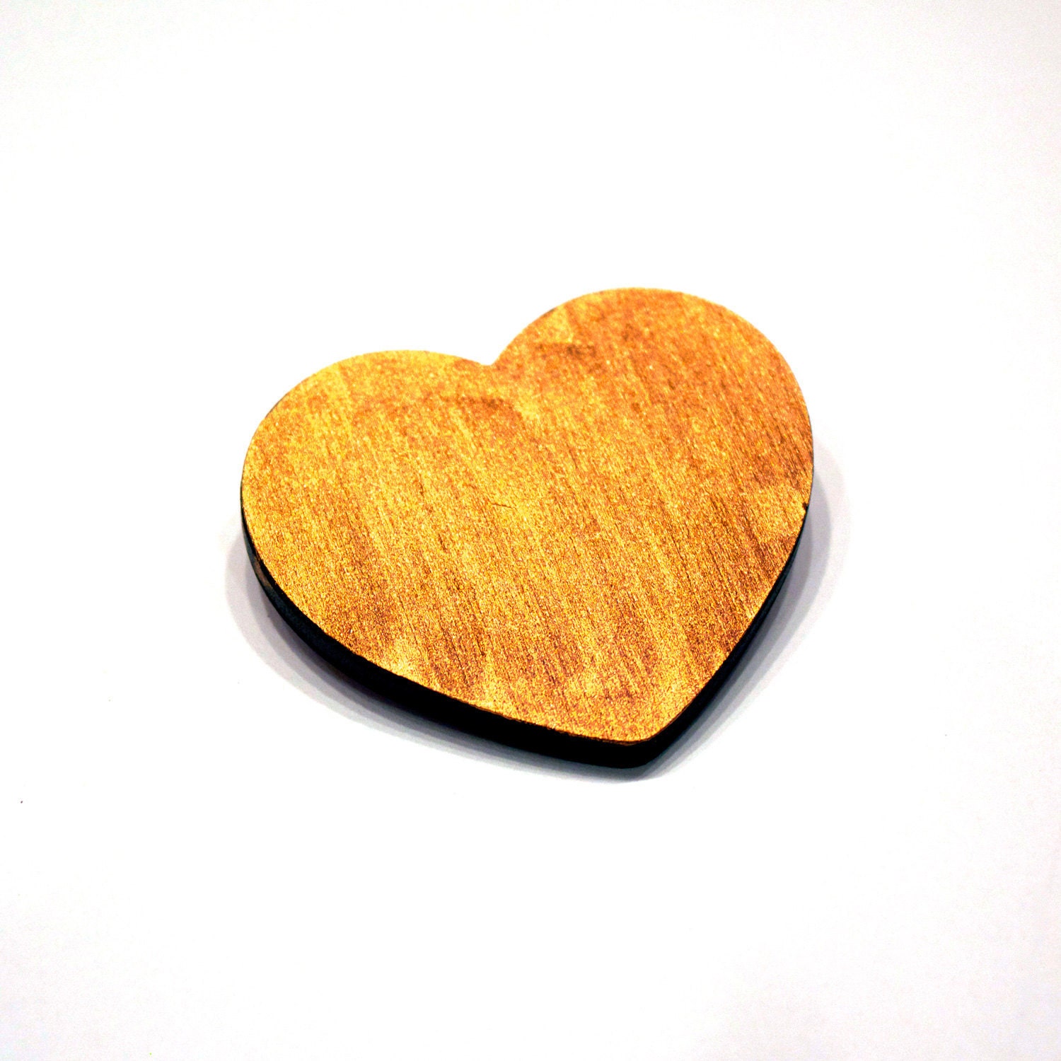 Golden heart brooch