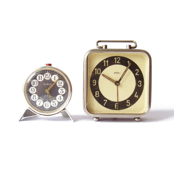 Set of two soviet Clocks - one working -  russian Slava and Mom vintage alarm mechanical clocks - green and black alarm clocks
