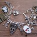 Pirates ARG Charm Bracelet. 15 charms, including snakes, pirates, pirate king