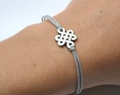 Infinity bracelet, gray cord bracelet with a silver endless knot charm, Yoga bracelet, Tibetan chinese celtic knot, Buddhist bracelet