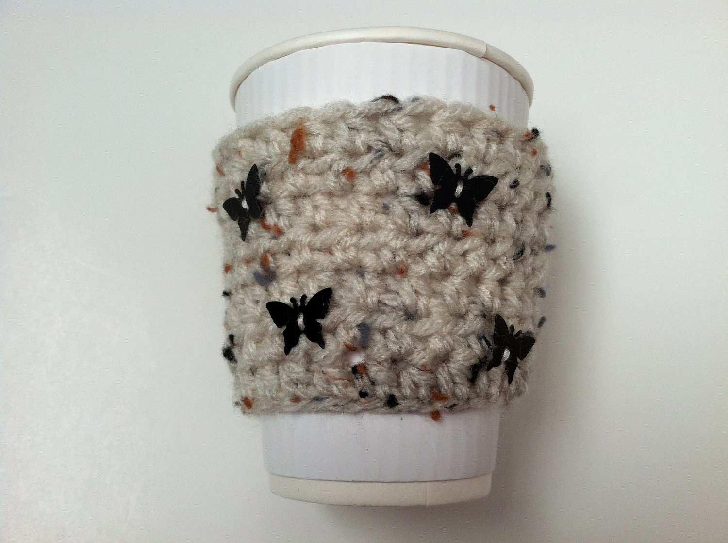 Crochet coffee cup sweater oatmeal flecked with black butterflies