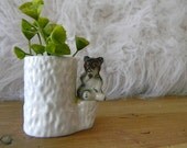 vintage squirrel and log figurine or match stick holder