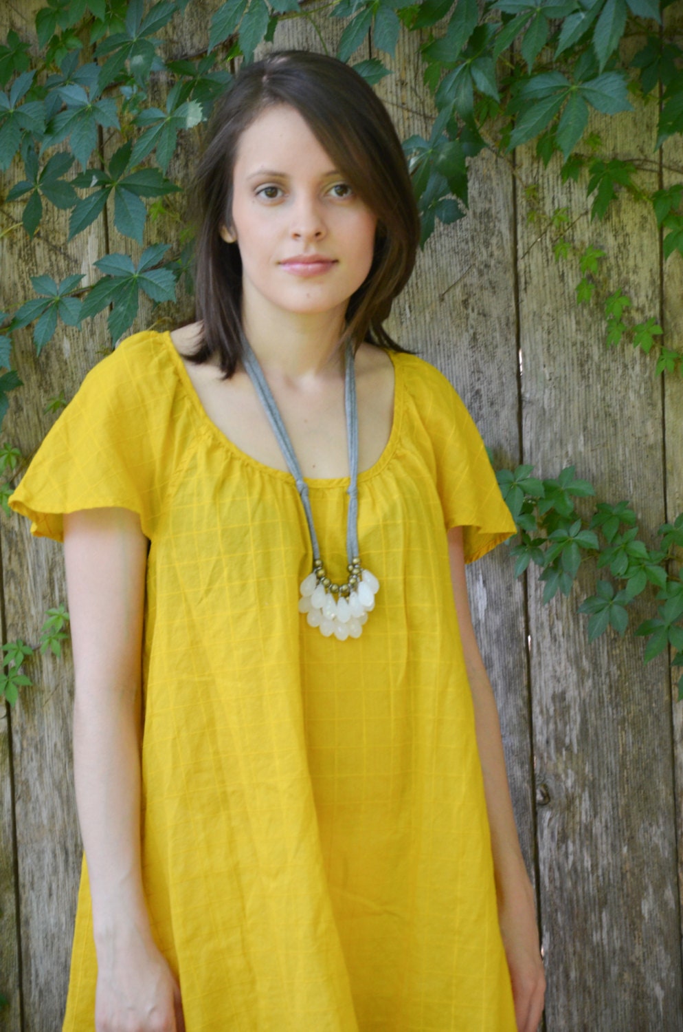 opaque white briolette with brass and gray necklace