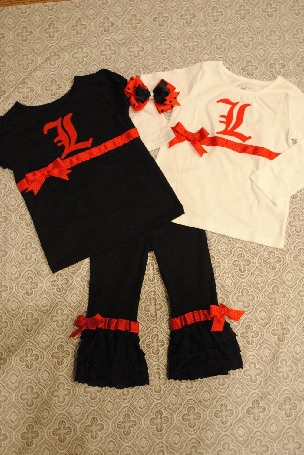 Variety of Teams Available.  Louisville Shirt and Ruffle Leggings with Bow Outfit