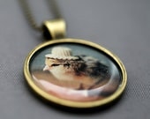 Photo Pendant Necklace of A Chick Wearing A Straw Hat