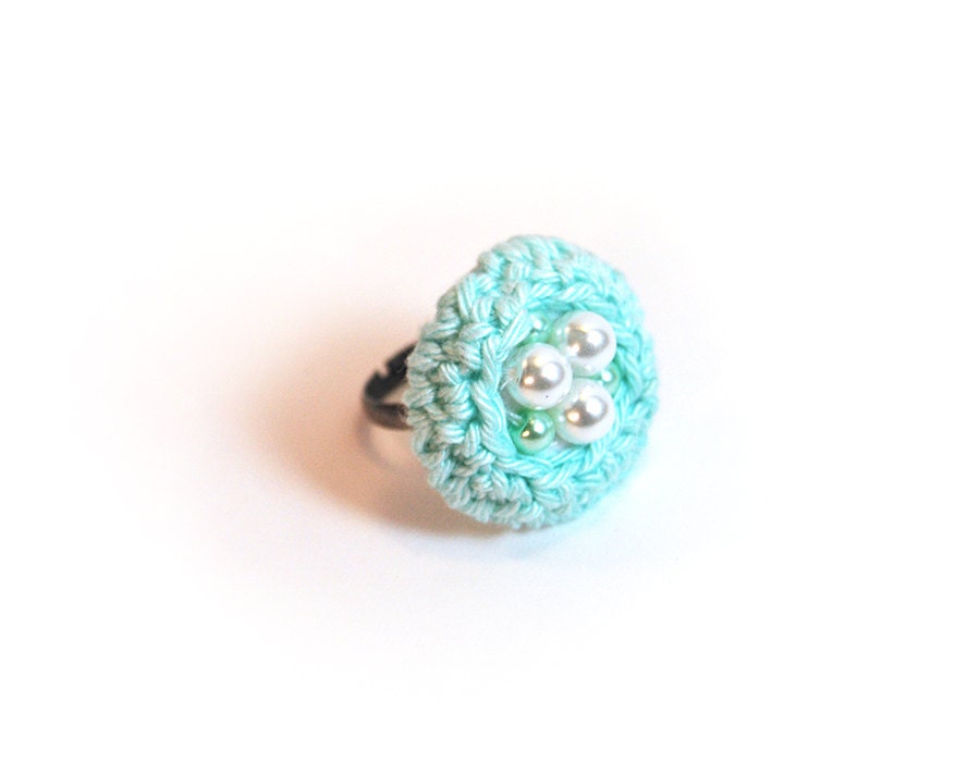 Mint green crochet ring with white and gold pearls. Adjustable ring. Bird nest ring.
