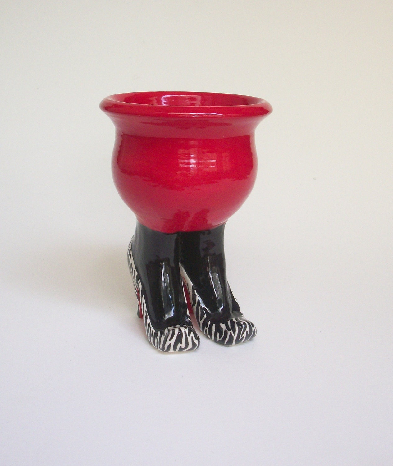 Red Sex Pot with Zebra Heels and Leggings
