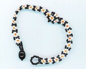 Friendship Bracelet . Beadwoven Floral . Black & White Beaded Bracelet . Daisy Daisies . OOAK - Field of Flowers by enchantedbeads on Etsy