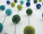 Blue and Green Wool Ball Garland on Green Cotton Thread