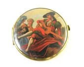 Vintage  Mirror, double sided, magnifying, featuring a troubadour