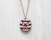 Pendant in ceramic. Embroidered Lace. OOAK