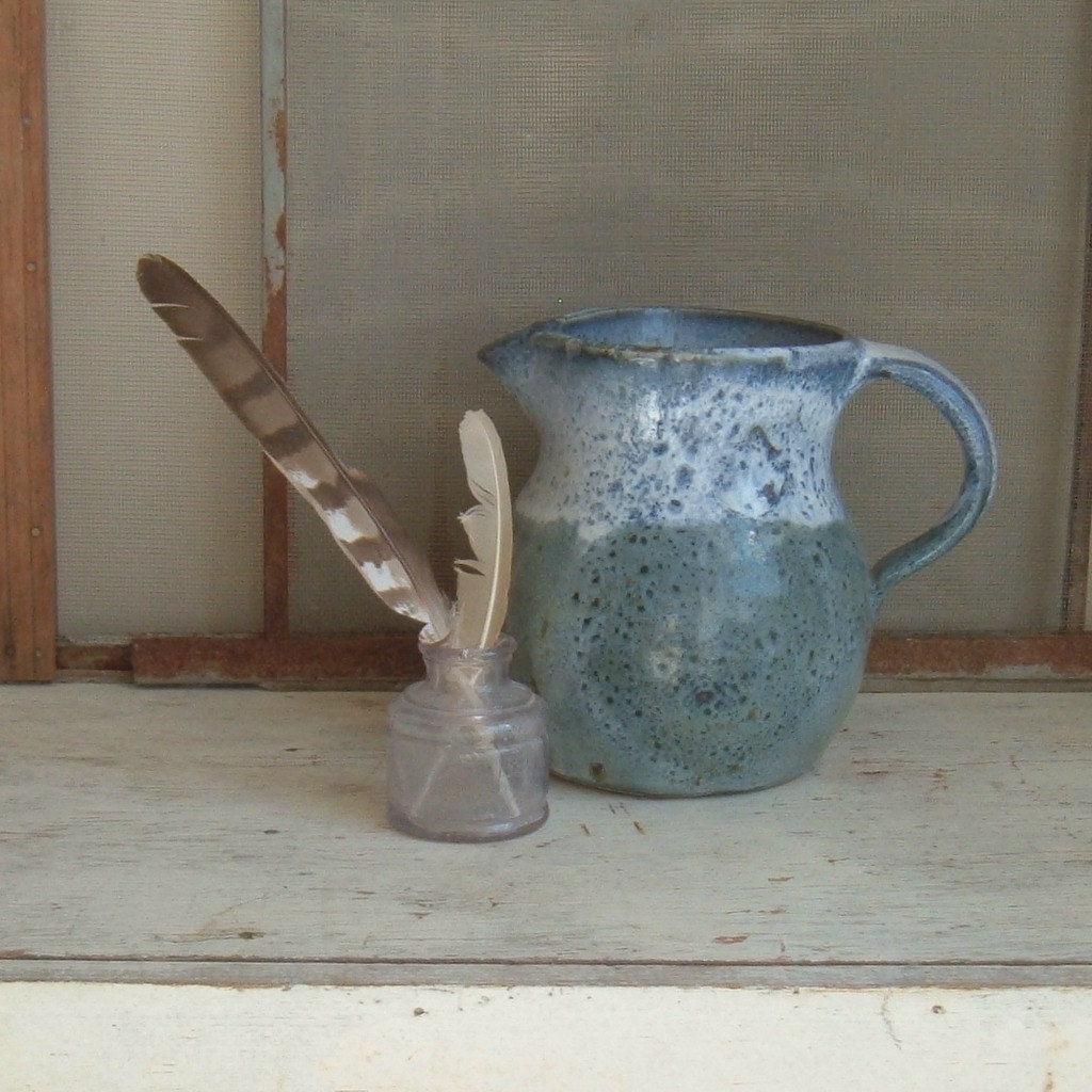 vintage blue pottery pitcher