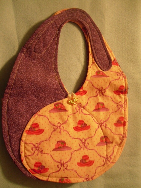 homemade red hat ladies cotton purse color is pink and purple.