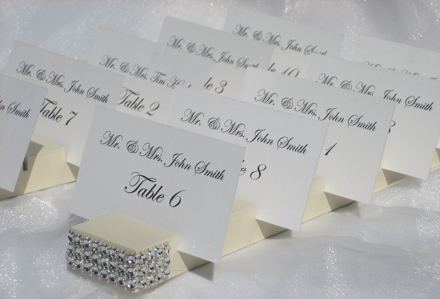 Ivory Wood Plank Place Card Holder trimmed with a crystal wrap on the front- Set of 10  (holds 100 place cards)