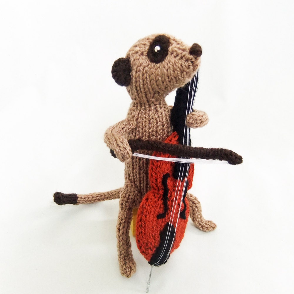 Meerkat cellist, musican meercat, animal playing cello, orchestra, band, knitted celloist