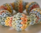 Creamy Soft Baby Rattle, Teething Ring -  Multicolored Blue, Green, Pink, and Yellow