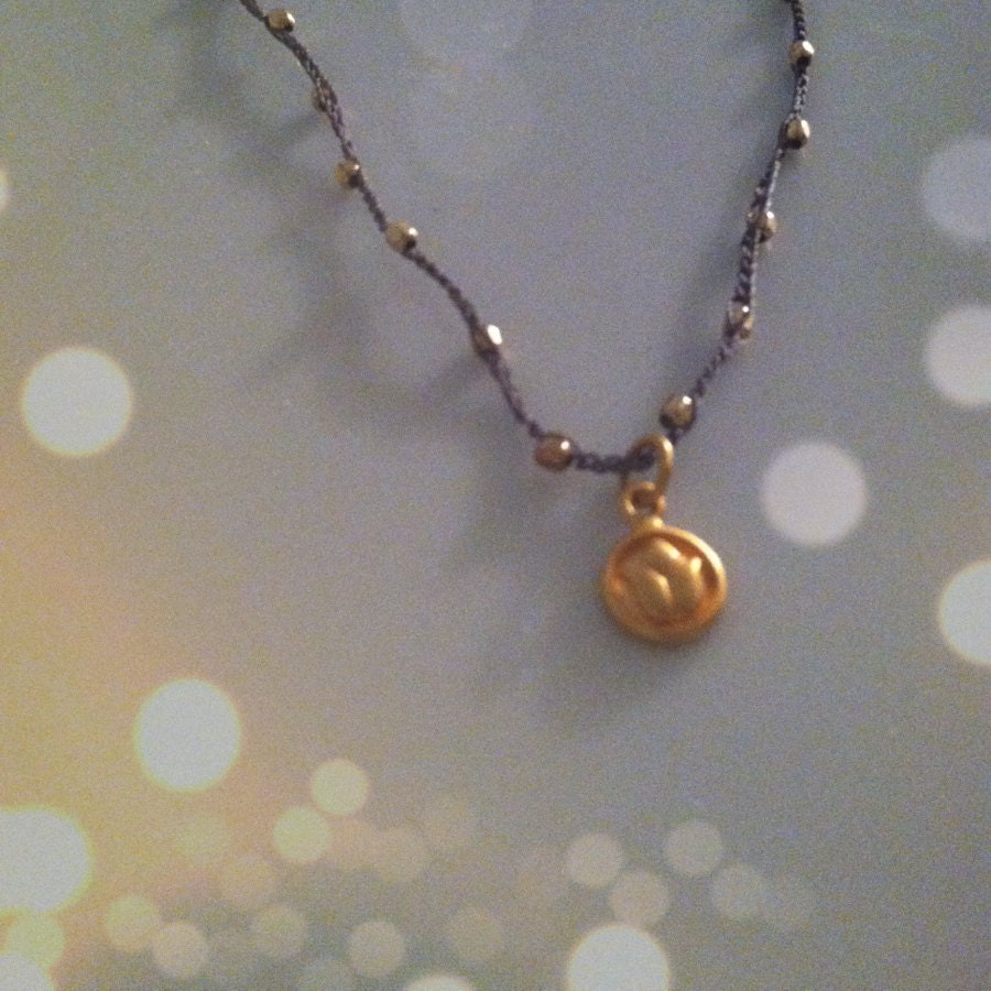 Gold Lotus Necklace on a Beaded Crochet Chain