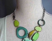 Green adjustable bib style necklace